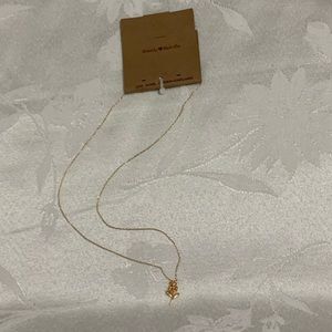 Brandy Melville gold rose